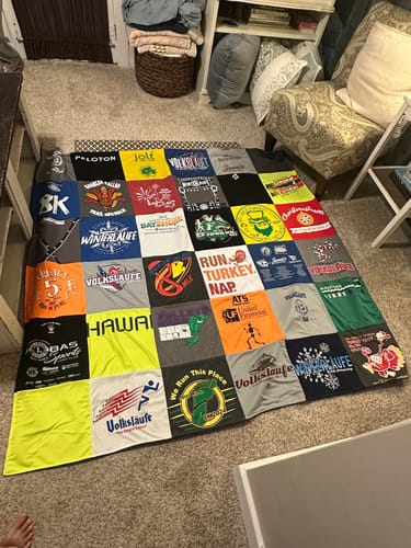 T-shirt quilt with running, outdoor activities themes by Melanie from MI