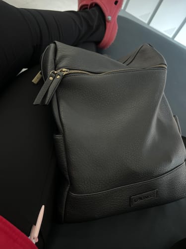 Reseña con foto de un cliente sobre Mochila Notebook Cierre Frontal