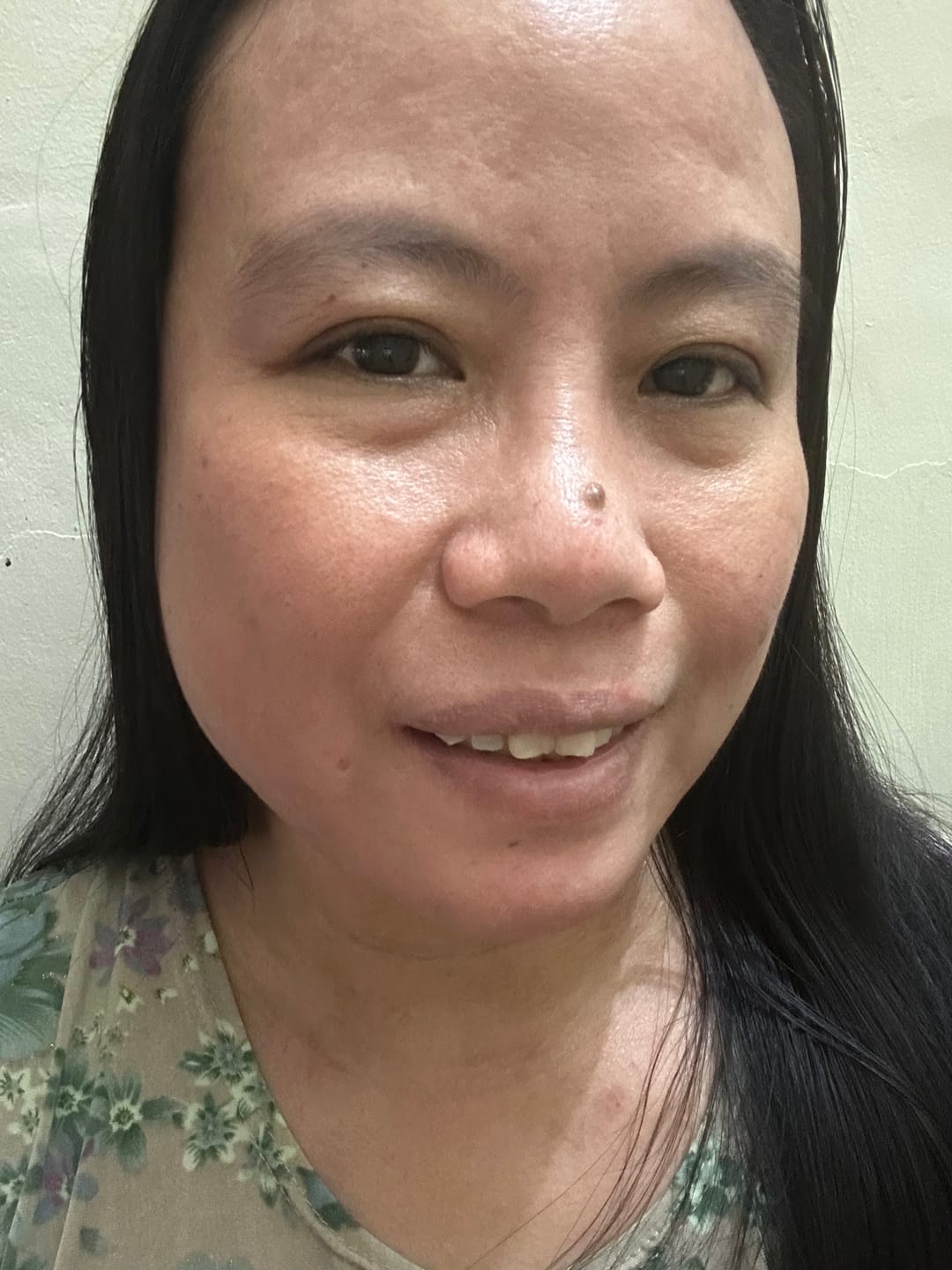 Customer photo review of Brightening UV Sunscreen & Skin Primer with SPF 50