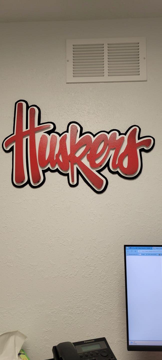 Customer photo review of Nebraska "HUSKERS" RED Script 3D Vintage Metal Wall Art