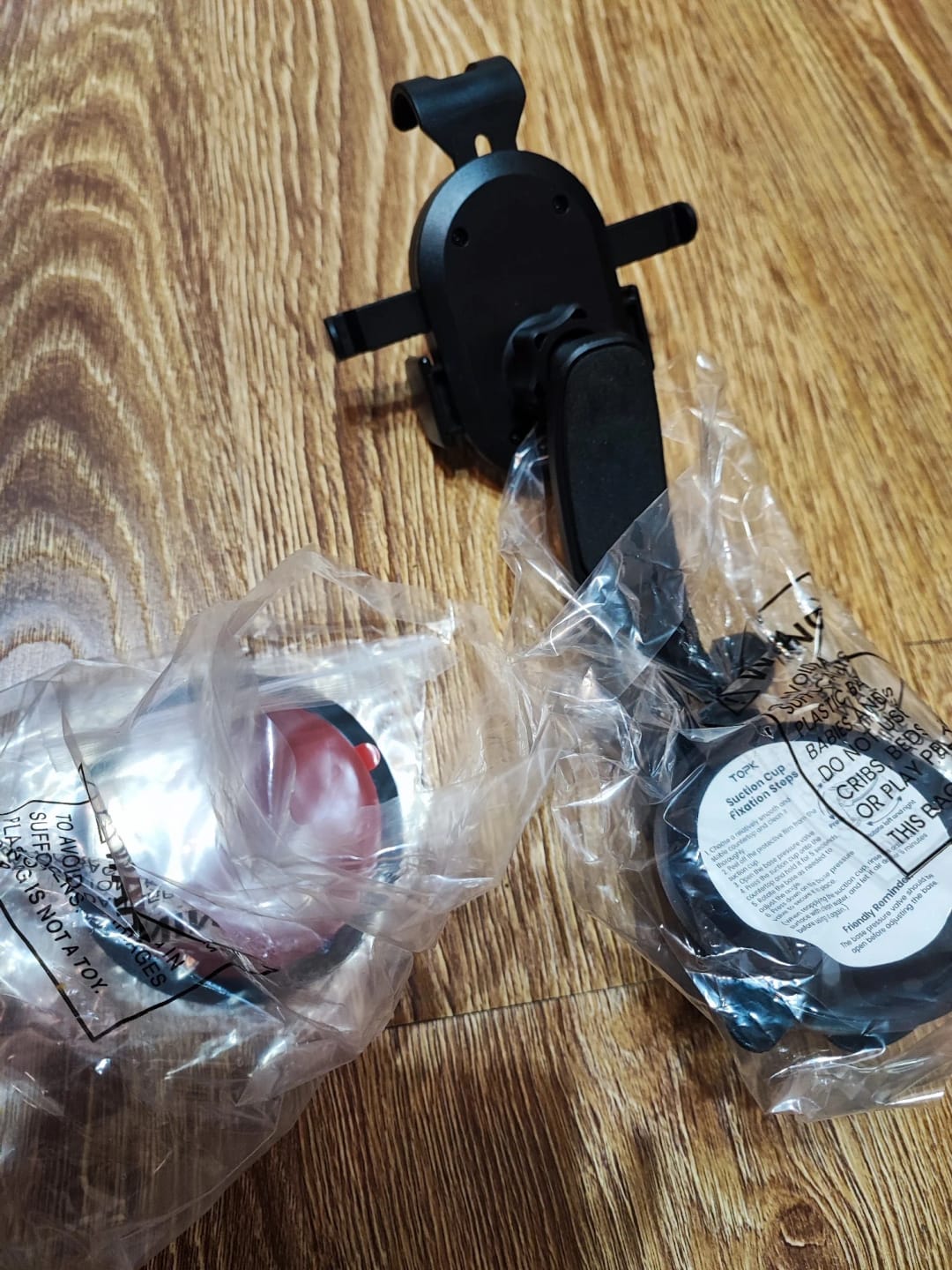 Customer photo review of Aluminum Car Phone Holder Mount 360° Rotatable Dashboard Mount Universal — Black | KIMLUD