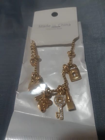 Customer photo review of Gold-Plated Stainless Steel Charm Bracelet — Gold-Tone | KIMLUD