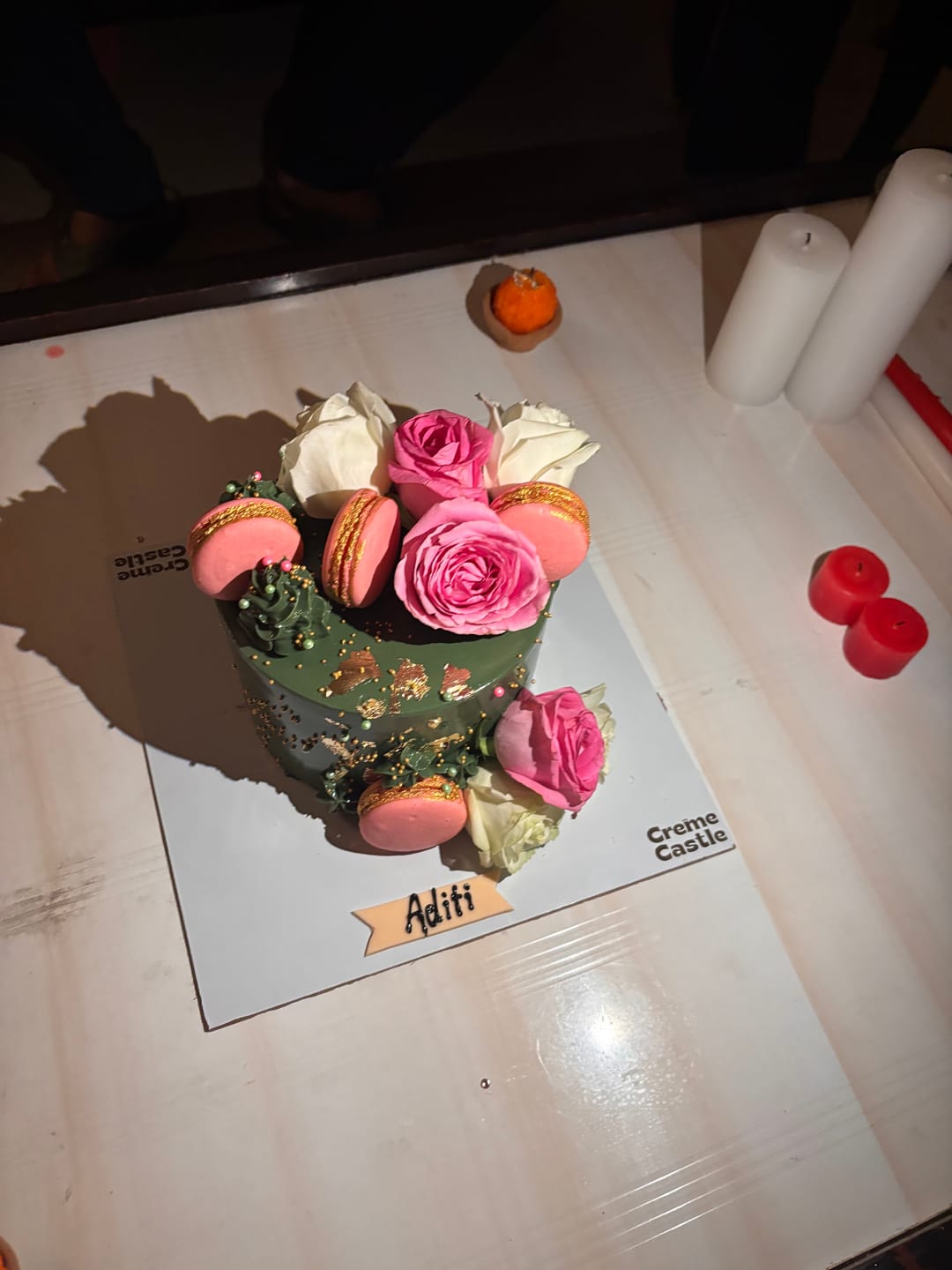 Customer photo review of Bottle Green Floral Cake