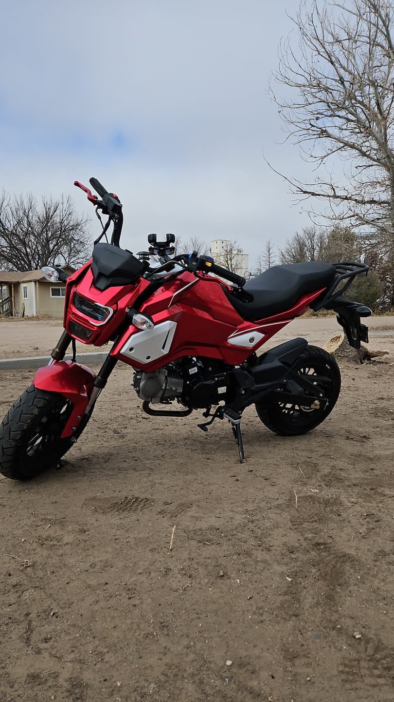 Customer photo review of Glossy Metallic Vampire Red Vinyl Wrap
