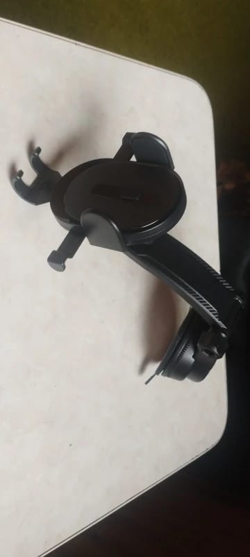Customer photo review of Aluminum Car Phone Holder Mount 360° Rotatable Dashboard Mount Universal — Black | KIMLUD