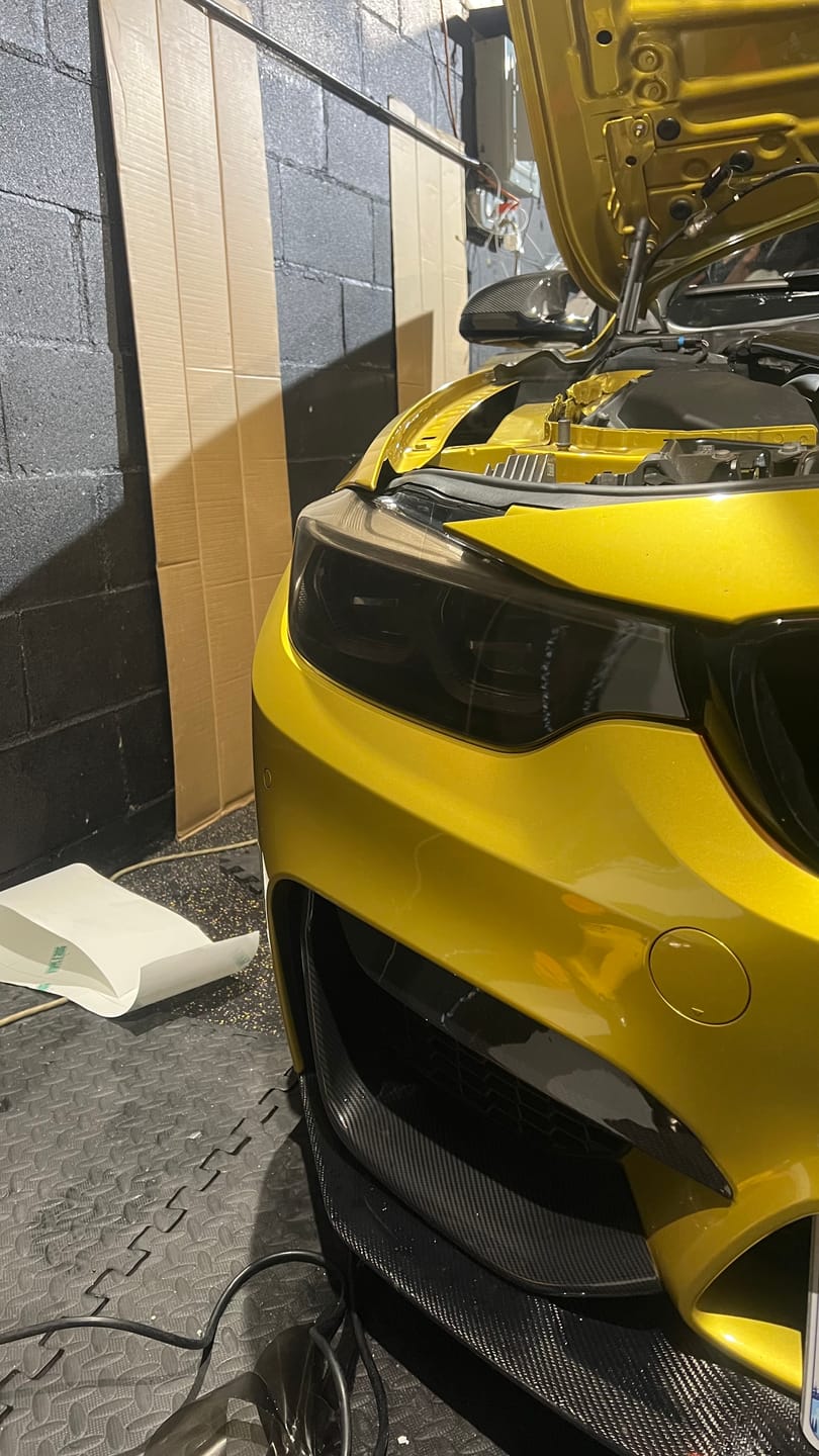 Customer photo review of Deep Black Headlight Film with Air Channel Paper Liner