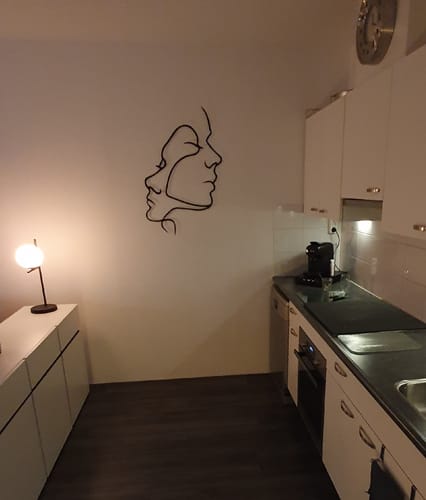 Customer photo review of Décoration Murale en Métal - Deux Visages