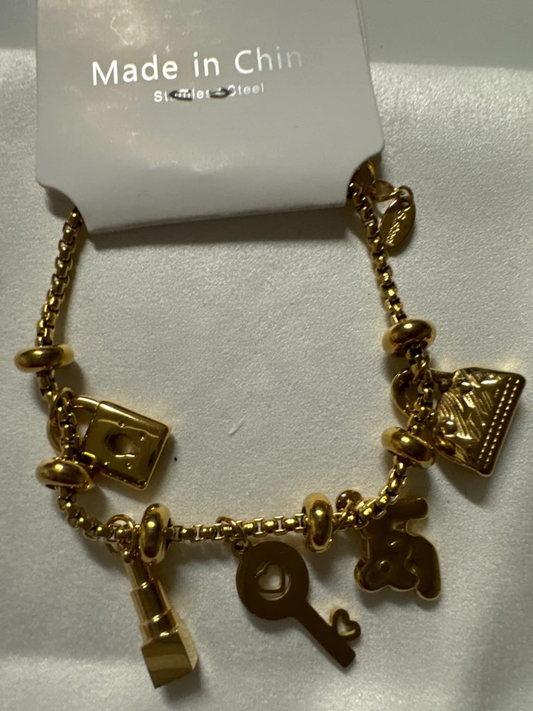 Customer photo review of Gold-Plated Stainless Steel Charm Bracelet — Gold-Tone | KIMLUD