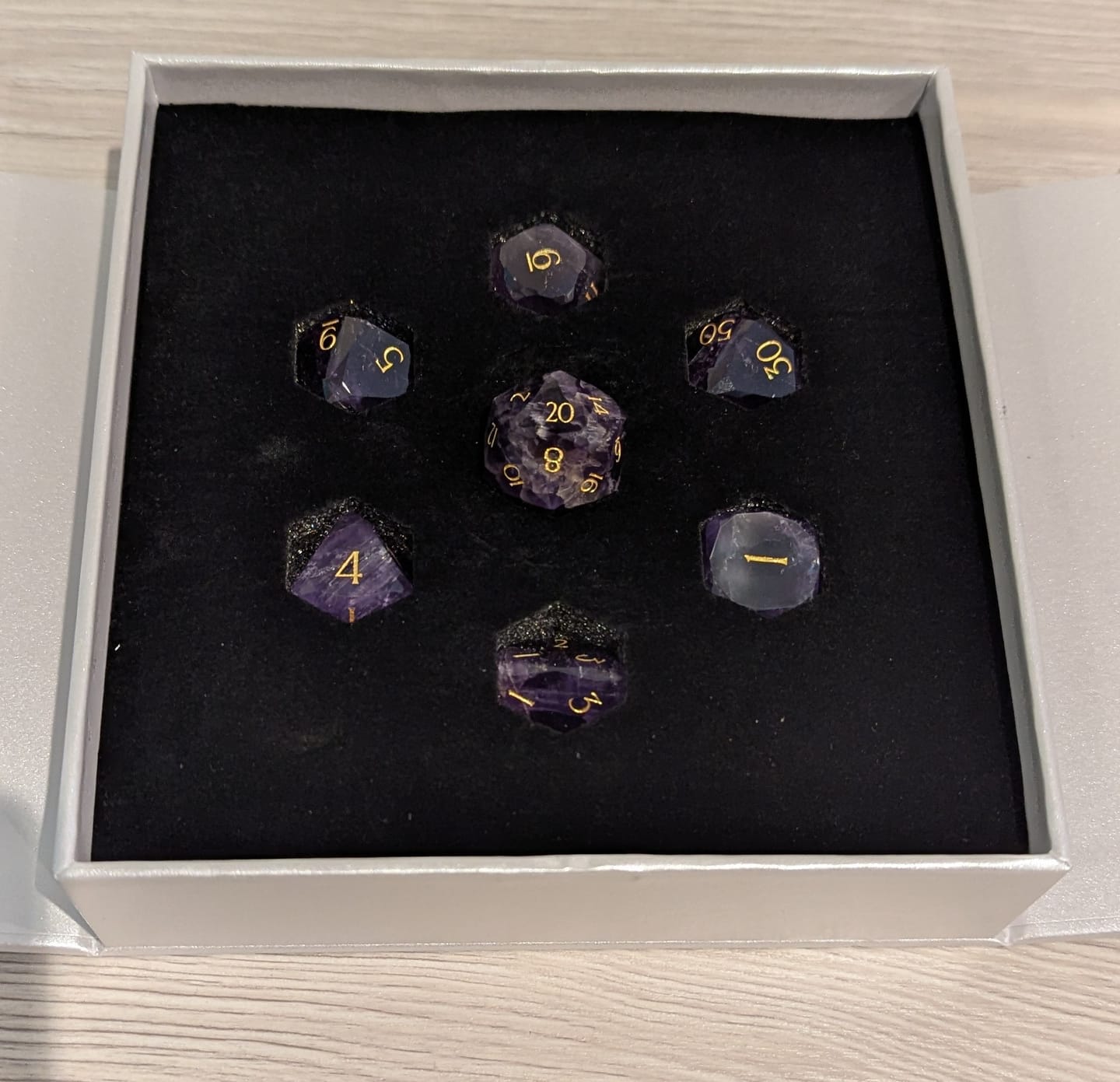 Customer photo review of URWizards D&D Multi-faceted Gemstone Engraved Dice Set