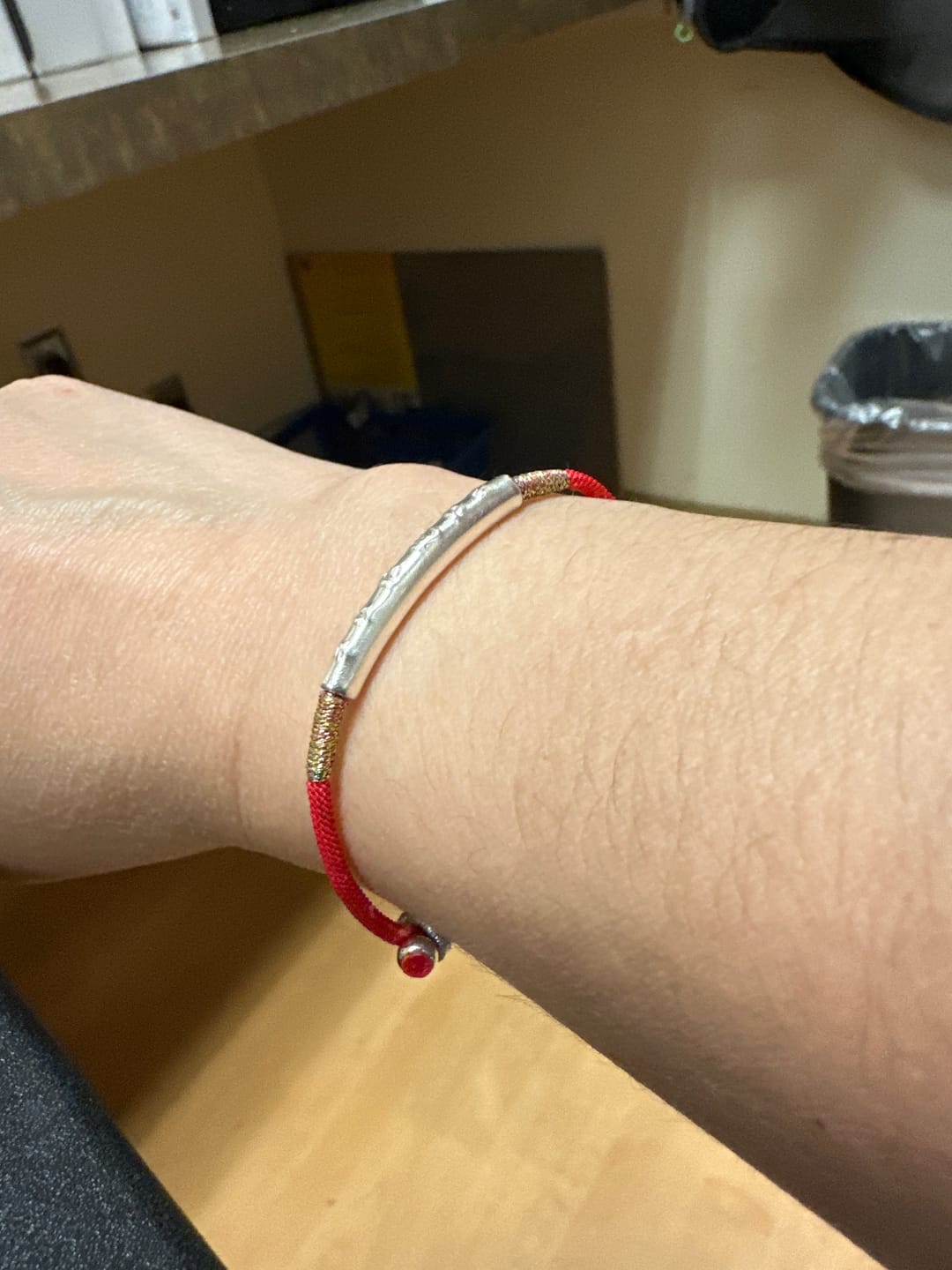 Customer photo review of Handmade 99 Silver Mantra Tibetan Buddhist Red String Bracelet - Protection & Good Luck