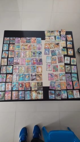 Customer photo review of 60/100Pcs Pokemon Cards All New EX Obsidian Flames Booster Box include Charizard English Version