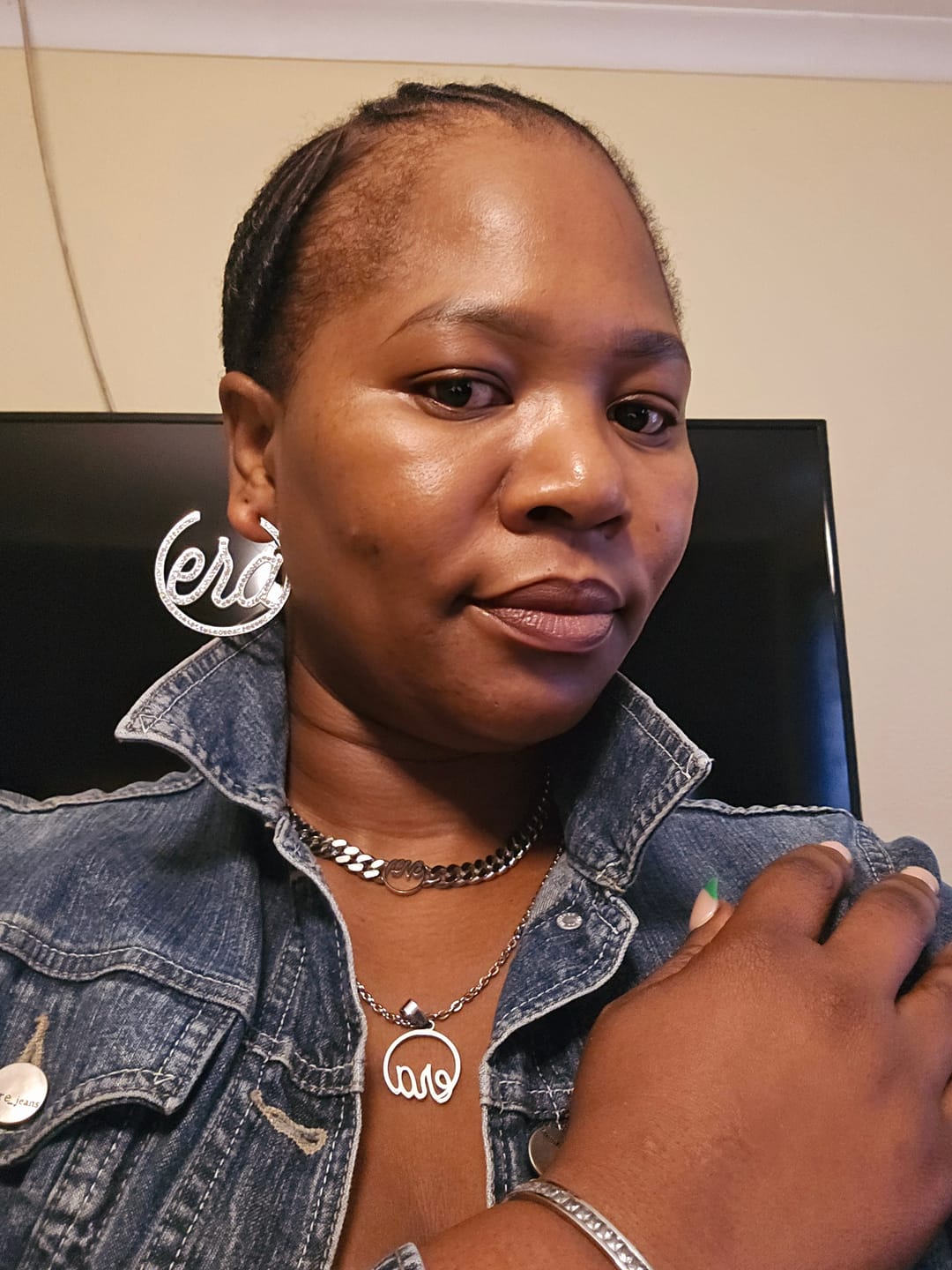 Customer photo review of Silver Luxe Logo Hoops