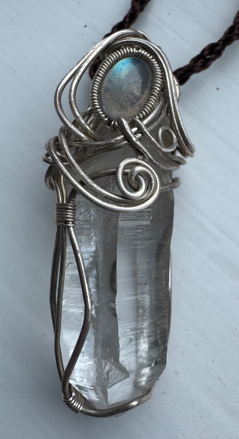 Customer photo review of Blissful Connection Love Energy Clear Quartz Silver Pendants