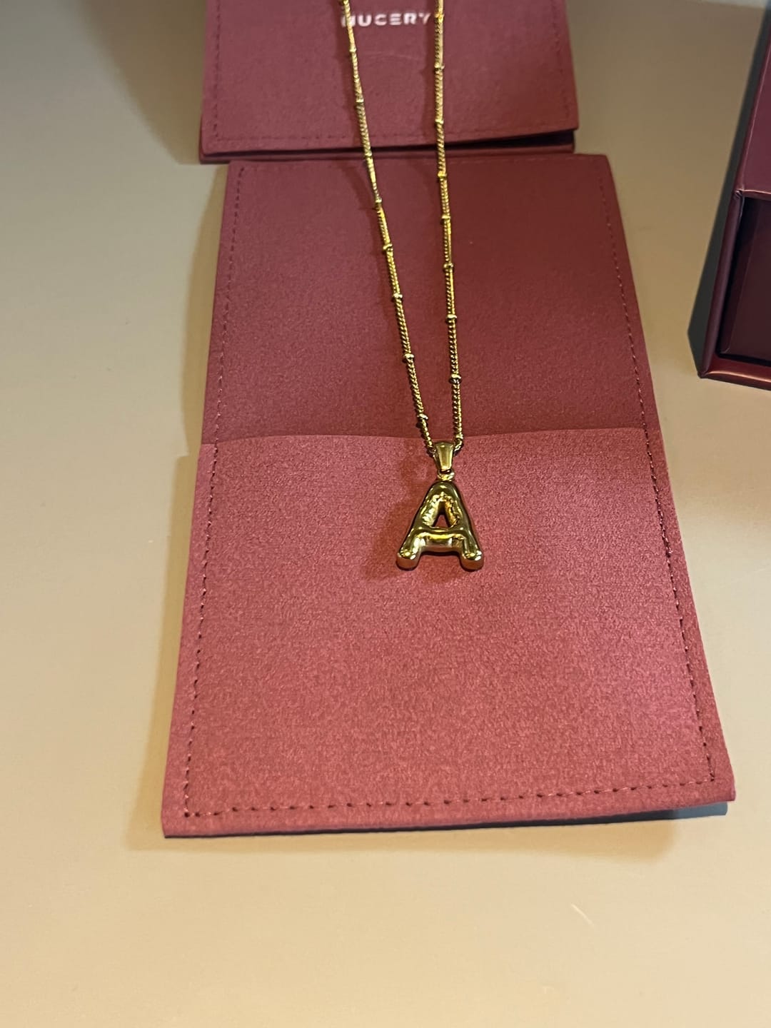 Customer photo review of Alphabet Necklace
