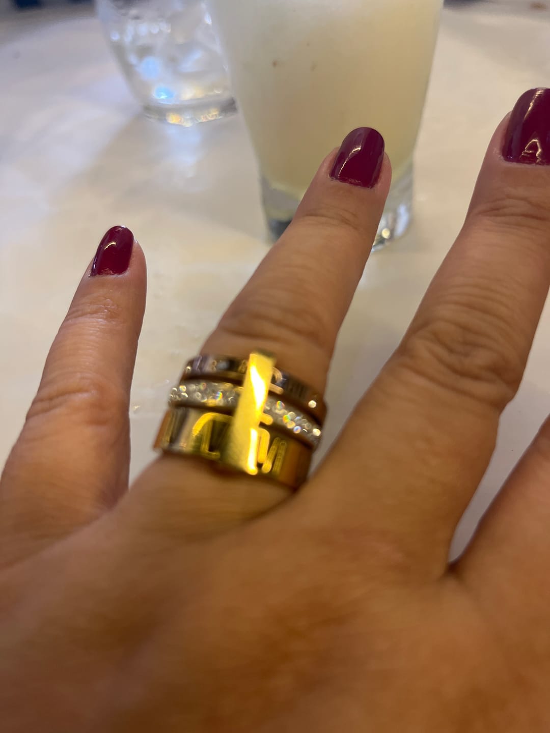 Customer photo review of Anel Triplo Momentos Banhado em Ouro 18k