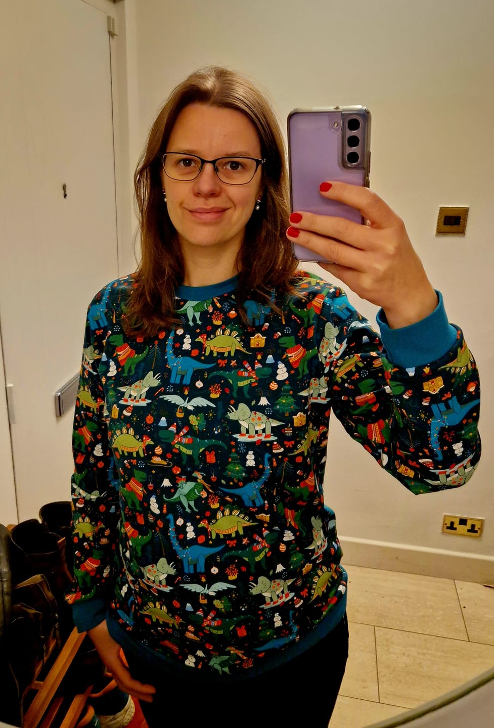 Customer photo review of Christmas Dinosaurs on Dark Teal French Terry Fabric