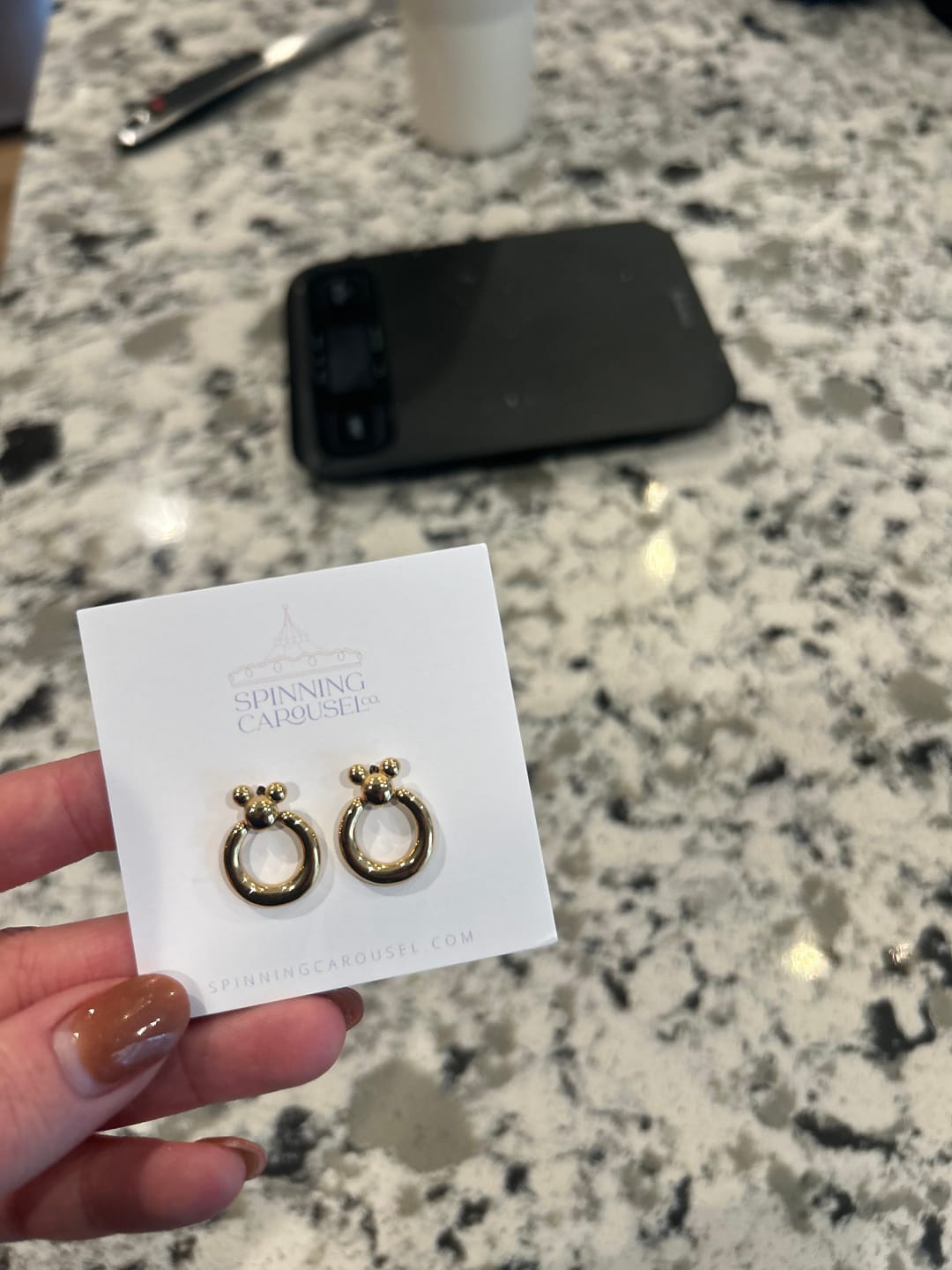 Customer photo review of Mini Leader of the Club Earrings