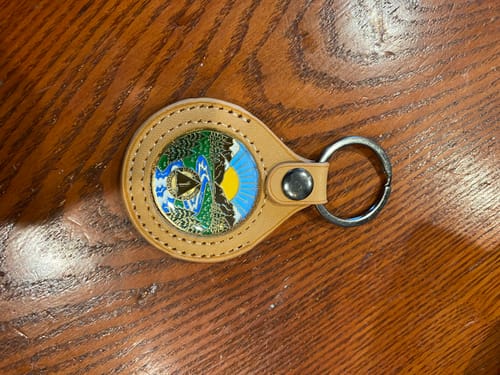 Customer photo review of 1 to 65 Year Sobriety Mint Winding River Gold Plated AA Recovery Medallion/Chip/Coin