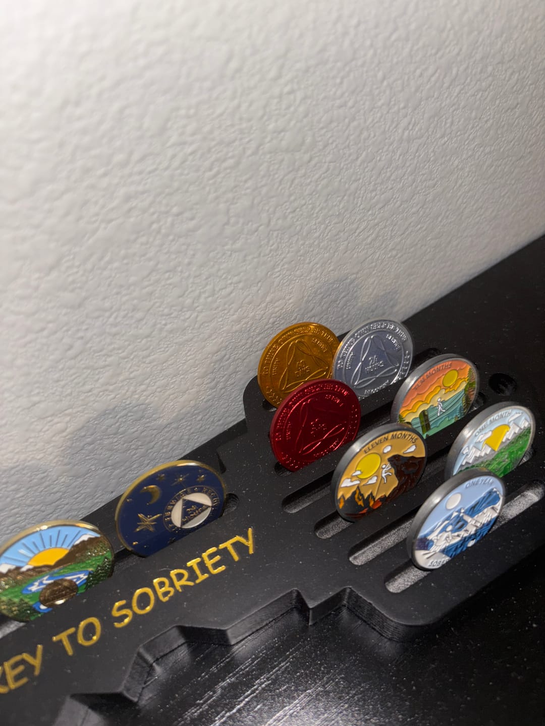 Customer photo review of Sobriety Mint Infinity Aluminum AA Meeting Newcomer Sobriety Chips/Coins/Tokens - 60 Days / 2 Months - Gold
