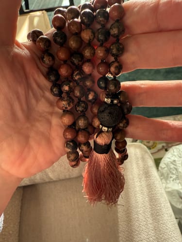 Customer photo review of 108 Natural Rhodonite & Black Lava Stone Mala Bead Necklace
