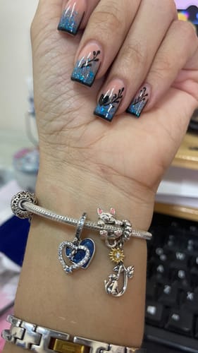 Customer photo review of Charm Girasol & Gatito Plateado