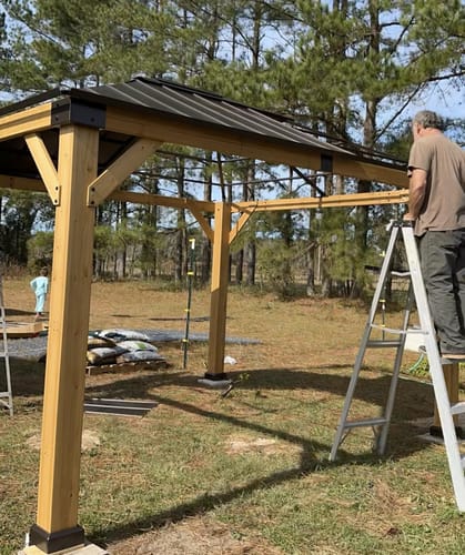 Customer photo review of SUNJOY 11x13 Wooden Gazebo with Solar Panel, LED Lights and Ceiling Hook - Driftwood Cedar