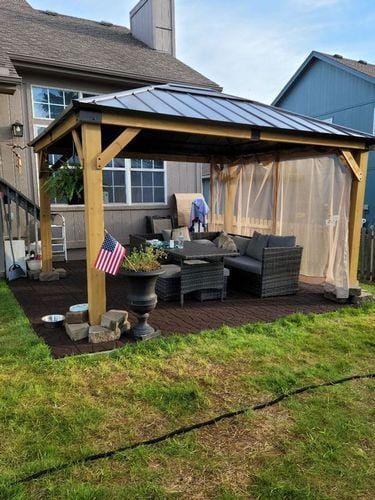 Customer photo review of SUNJOY 11x13 Wooden Gazebo with Solar Panel, LED Lights and Ceiling Hook - Driftwood Cedar