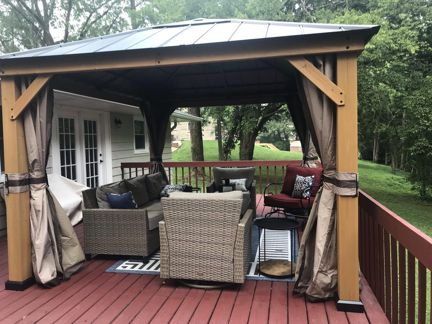 Customer photo review of SUNJOY 11x13 Wooden Gazebo with Solar Panel, LED Lights and Ceiling Hook - Driftwood Cedar