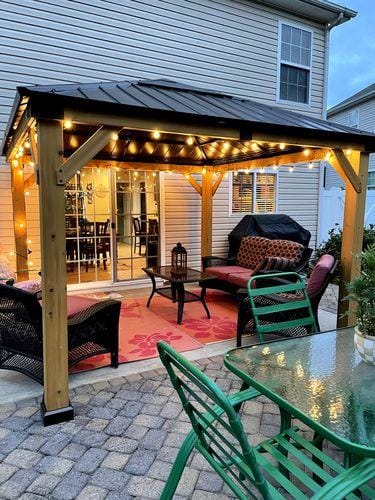 Customer photo review of SUNJOY 11x13 Wooden Gazebo with Solar Panel, LED Lights and Ceiling Hook - Driftwood Cedar