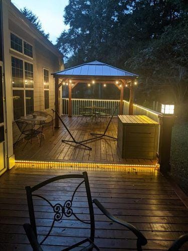 Customer photo review of SUNJOY 11x13 Wooden Gazebo with Solar Panel, LED Lights and Ceiling Hook - Driftwood Cedar