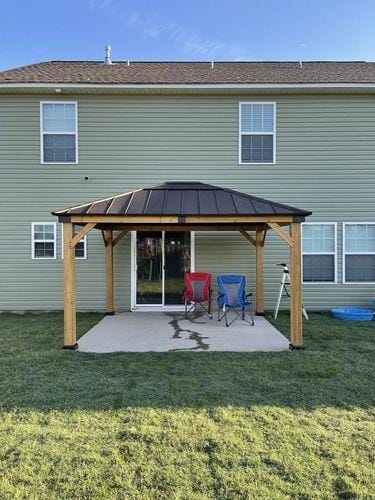 Customer photo review of SUNJOY 11x13 Wooden Gazebo with Solar Panel, LED Lights and Ceiling Hook - Driftwood Cedar