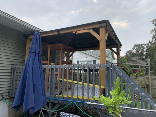 Customer photo review of SUNJOY 11x13 Wooden Gazebo with Solar Panel, LED Lights and Ceiling Hook - Driftwood Cedar