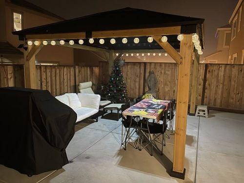 Customer photo review of SUNJOY 11x13 Wooden Gazebo with Solar Panel, LED Lights and Ceiling Hook - Driftwood Cedar