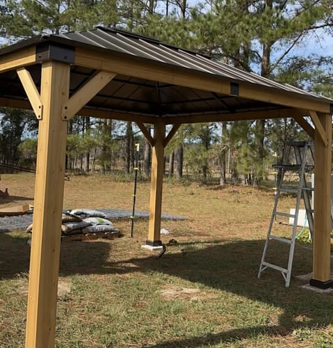 Customer photo review of SUNJOY 11x13 Wooden Gazebo with Solar Panel, LED Lights and Ceiling Hook - Driftwood Cedar