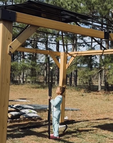 Customer photo review of SUNJOY 11x13 Wooden Gazebo with Solar Panel, LED Lights and Ceiling Hook - Driftwood Cedar