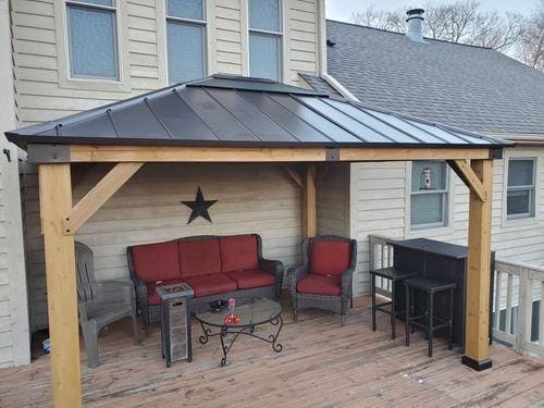 Customer photo review of SUNJOY 11x13 Wooden Gazebo with Solar Panel, LED Lights and Ceiling Hook - Driftwood Cedar