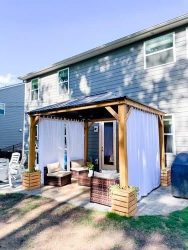 Customer photo review of SUNJOY 11x13 Wooden Gazebo with Solar Panel, LED Lights and Ceiling Hook - Driftwood Cedar