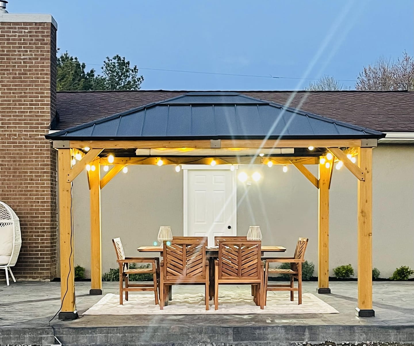 Customer photo review of SUNJOY 11x13 Wooden Gazebo with Solar Panel, LED Lights and Ceiling Hook - Driftwood Cedar