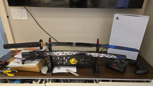 Customer photo review of Black Blade Katana (1060 carbon steel)