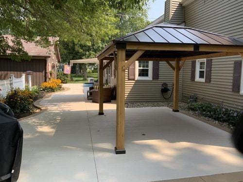 Customer photo review of SUNJOY 11x13 Wooden Gazebo with Solar Panel, LED Lights and Ceiling Hook - Driftwood Cedar