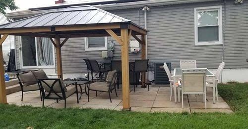 Customer photo review of SUNJOY 11x13 Wooden Gazebo with Solar Panel, LED Lights and Ceiling Hook - Driftwood Cedar