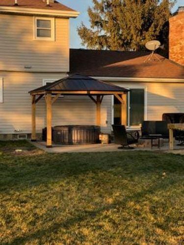Customer photo review of SUNJOY 11x13 Wooden Gazebo with Solar Panel, LED Lights and Ceiling Hook - Driftwood Cedar