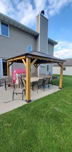 Customer photo review of SUNJOY 11x13 Wooden Gazebo with Solar Panel, LED Lights and Ceiling Hook - Driftwood Cedar