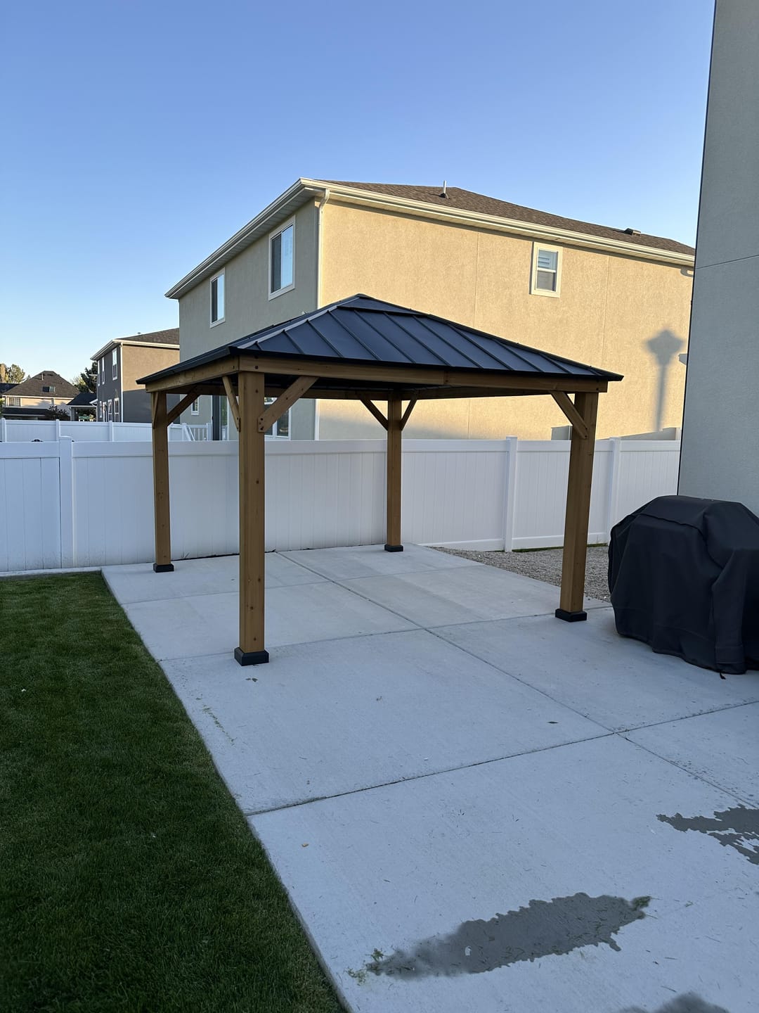 Customer photo review of SUNJOY 11x13 Wooden Gazebo with Solar Panel, LED Lights and Ceiling Hook - Driftwood Cedar