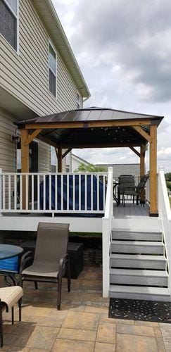 Customer photo review of SUNJOY 11x13 Wooden Gazebo with Solar Panel, LED Lights and Ceiling Hook - Driftwood Cedar