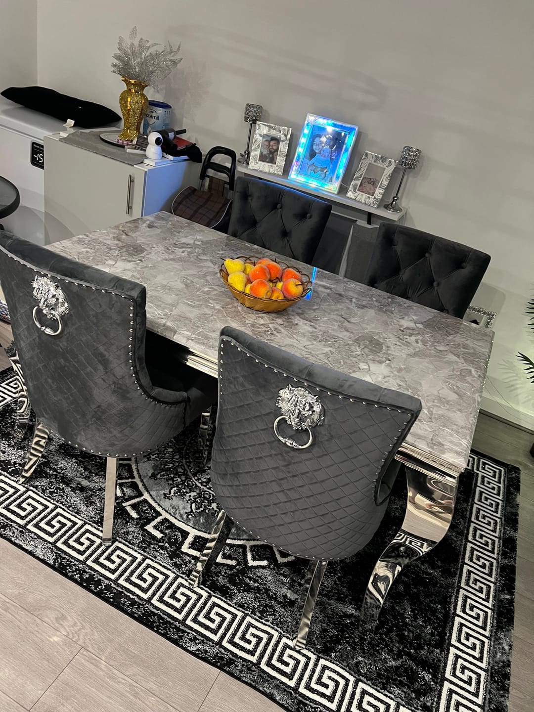 Customer photo review of Vienna Marble Dining Table With Bently Knocker Chairs lion