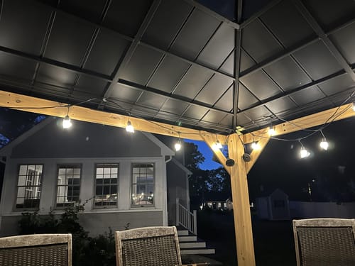 Customer photo review of SUNJOY 11x13 Wooden Gazebo with Solar Panel, LED Lights and Ceiling Hook - Driftwood Cedar