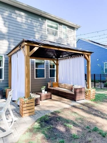 Customer photo review of SUNJOY 11x13 Wooden Gazebo with Solar Panel, LED Lights and Ceiling Hook - Driftwood Cedar