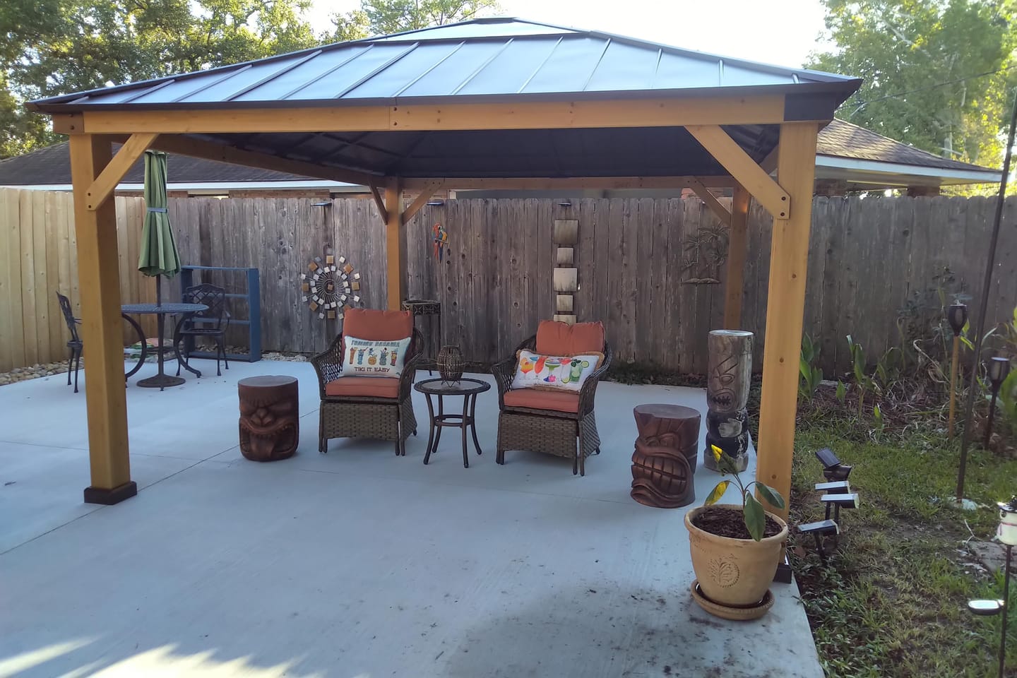 Customer photo review of SUNJOY 11x13 Wooden Gazebo with Solar Panel, LED Lights and Ceiling Hook - Driftwood Cedar