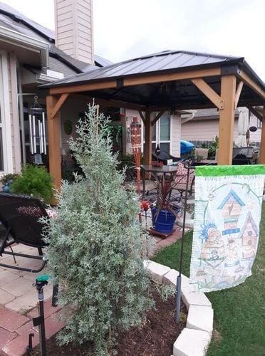 Customer photo review of SUNJOY 11x13 Wooden Gazebo with Solar Panel, LED Lights and Ceiling Hook - Driftwood Cedar
